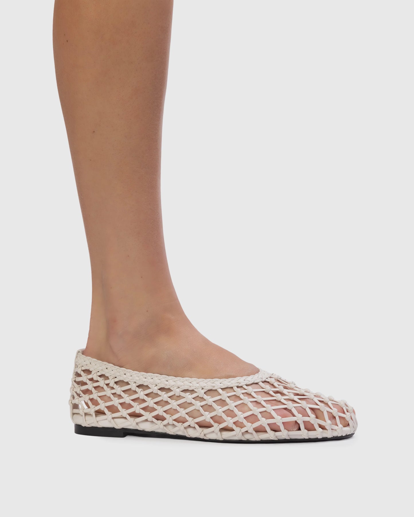 Black Suede Studio Sonia Flat, Almond shaped toe ballerina with handwoven leather detail. Made with smooth buffed leather.