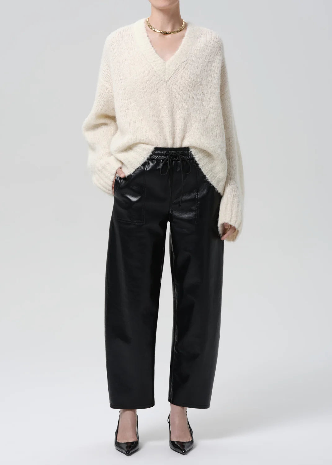 Citizens of Humanity Recycled Leather Rework Pull on Pant, a relaxed, ankle-length silhouette with a drawstring waistband and patch pockets. Crafted from midweight recycled leather. Women's clothing