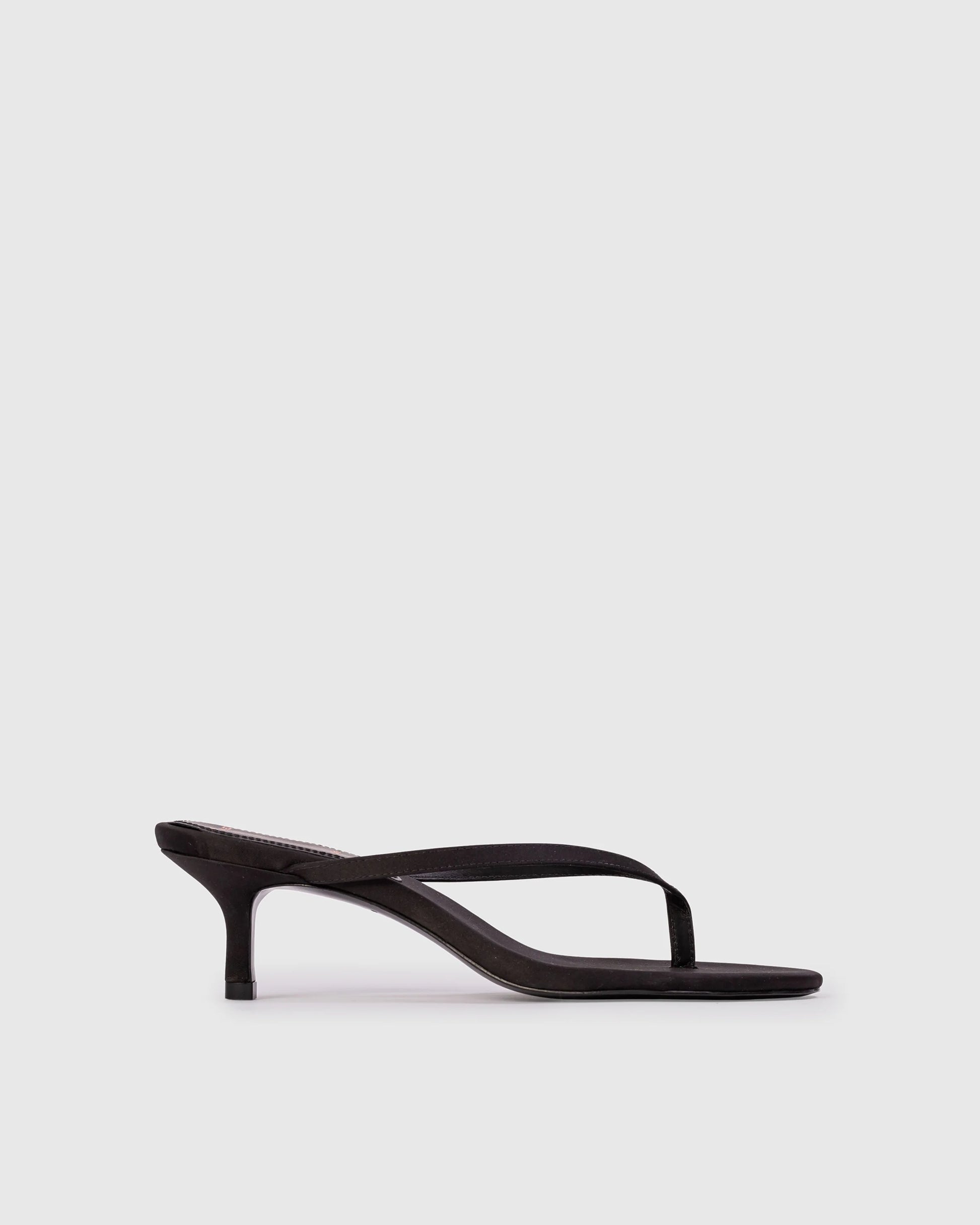 Black Suede Studio Tash 50: round toe thong slipper mule, set on a curved low heel. Made with crepe satin, women's shoes