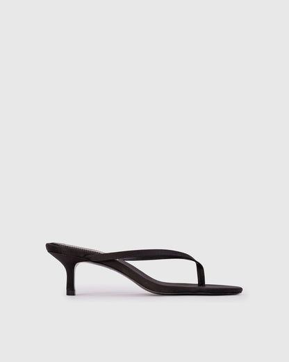 Black Suede Studio Tash 50: round toe thong slipper mule, set on a curved low heel. Made with crepe satin, women's shoes