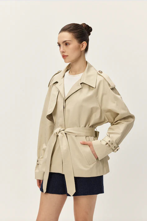 The Elodie Noa Cropped Khaki Trench Coat is a modern, cropped take on the classic trench. tie waist for a flattering shape, Signature trench, women's clothing