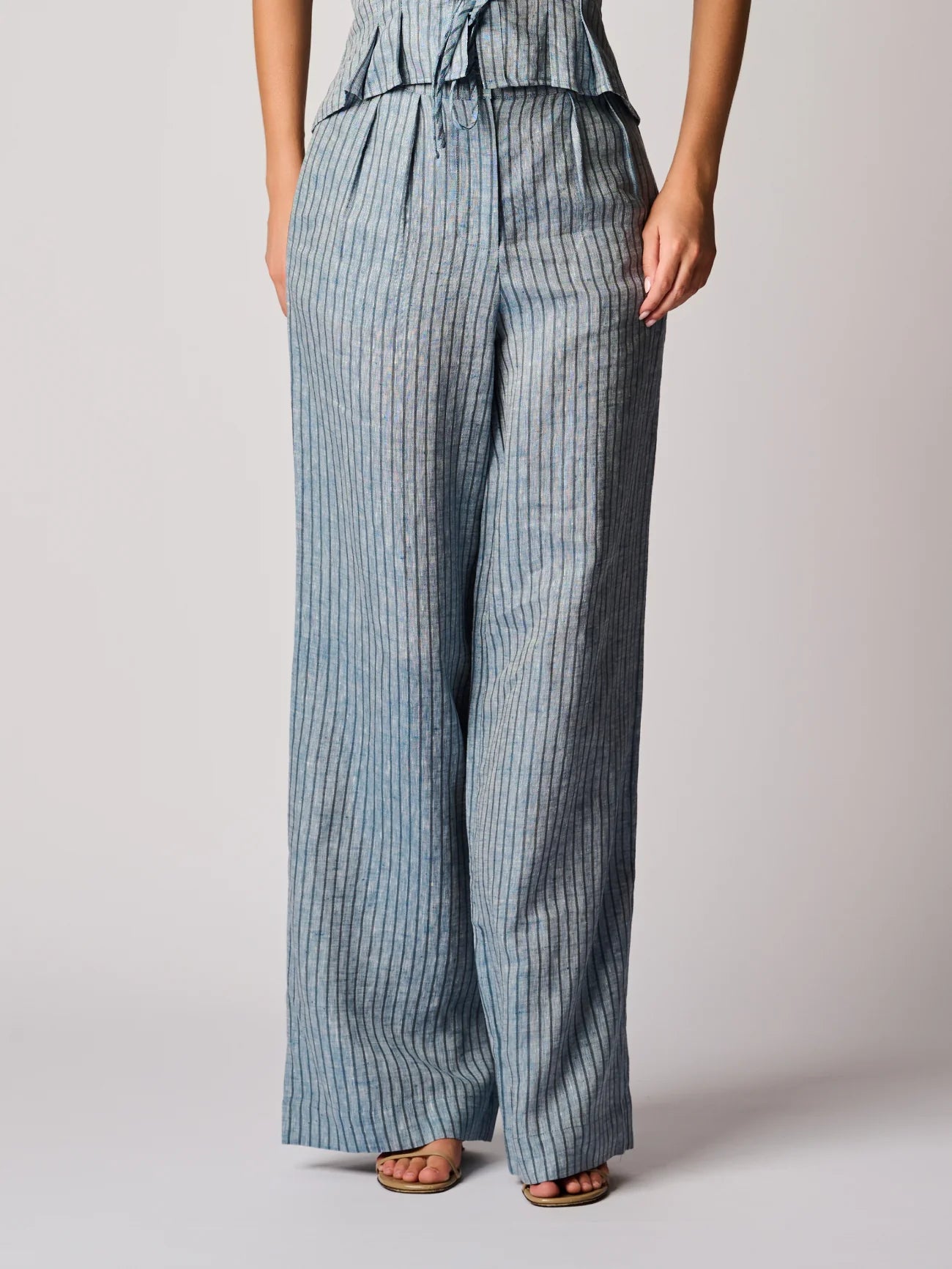 HEVRON Alina Pant, 100% linen stripe, high-rise waist, pleated front, and zip and button closure, wide-leg silhouette, women's clothing
