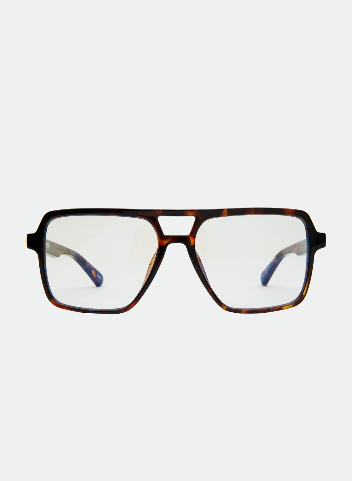 OTRA Zoya Sunglasses Blue Light, oversized square aviator-style eyeglasses with a dark brown and black tortoiseshell frame and clear lenses, women's accessories