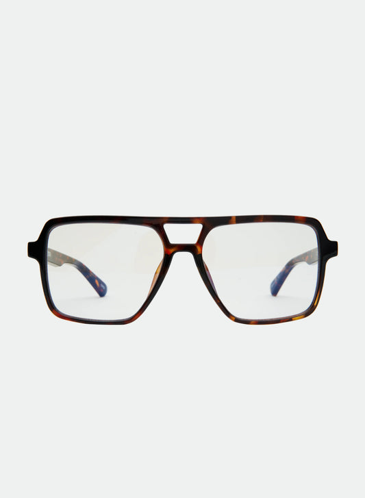 OTRA Zoya Sunglasses Blue Light, oversized square aviator-style eyeglasses with a dark brown and black tortoiseshell frame and clear lenses, women's accessories